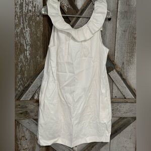 TRINA TURK WHITE SLEEVELESS RUFFLE SHIFT DRESS.